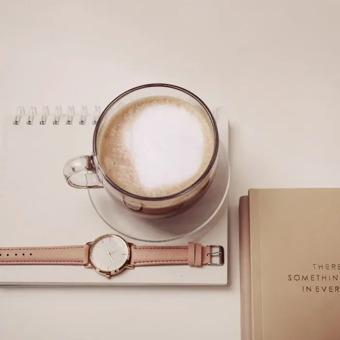 Flatlay-watch-coffee-notebook.webp